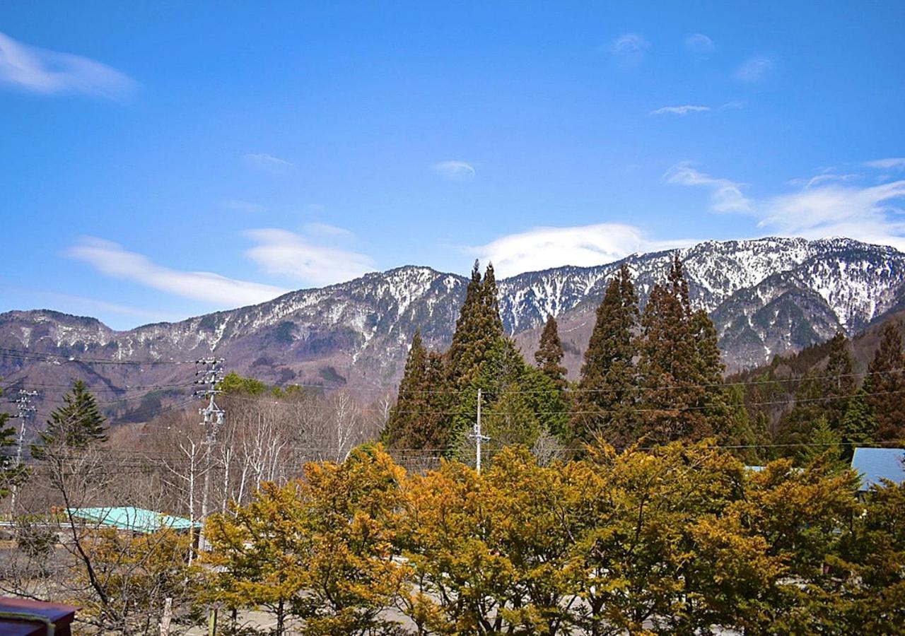 Отель 筋肉と自然と遊ぶ宿 田島館 Такаяма Номер фото